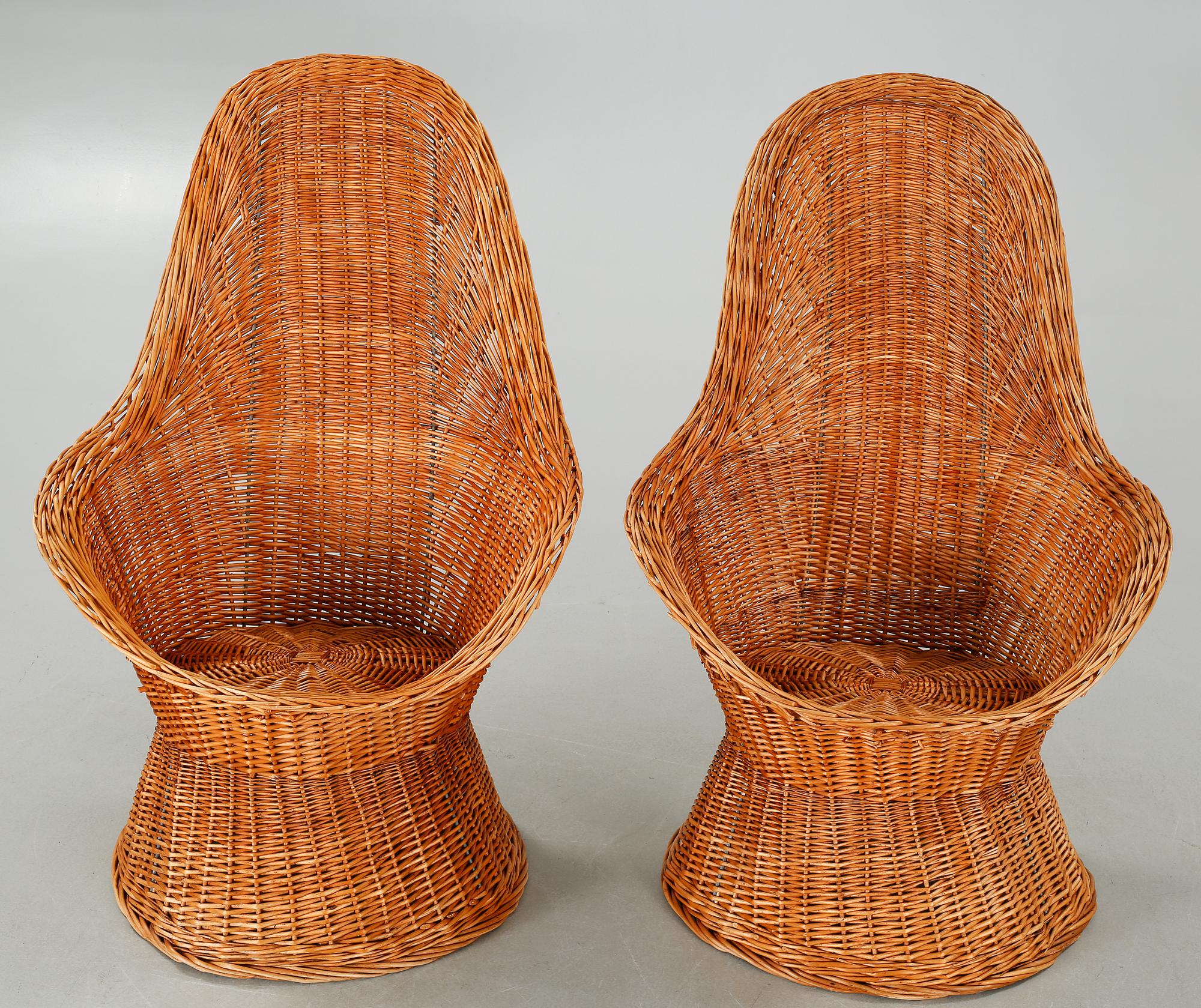 A pair of chairs and one table from the latter half of the 20th century.