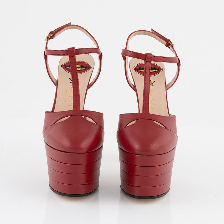 Gucci, a pair of red leather high heel shoes, 2016, size 37.