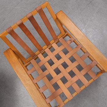 Svante Skogh, a pair of 'Bodö' oak easy chairs, AB Hjertquist & Co, Nässjö, designed in 1957.