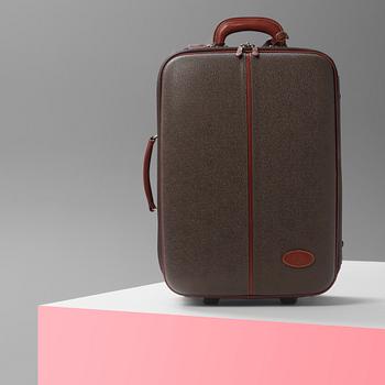 A hardsided trolley by Mulberry.