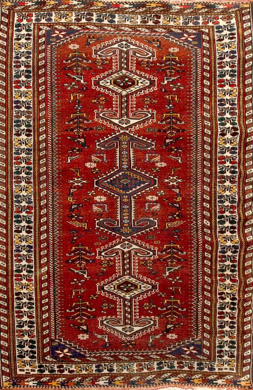 A semiantique/antique Caucasian carpet ca 210 x 130 cm.