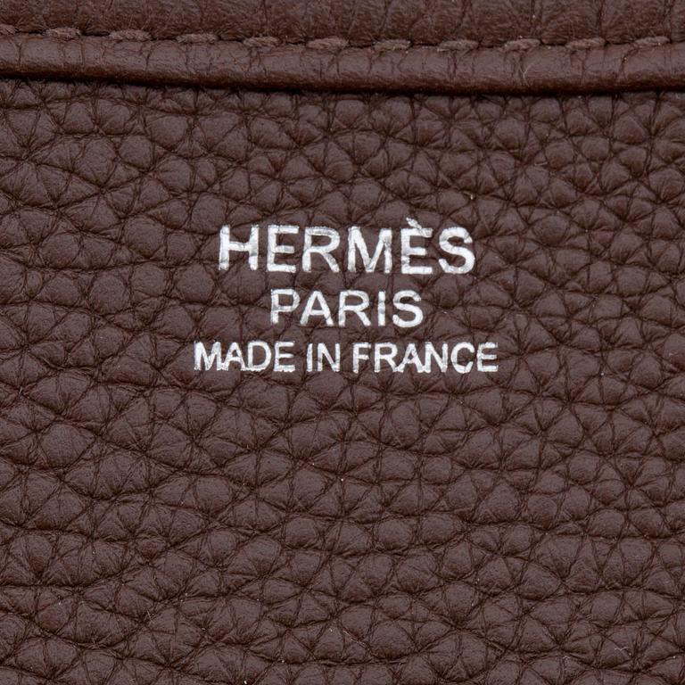 HERMÈS, a taurillon clemence chocolat shoulder bag, "Evelyn III / GM".