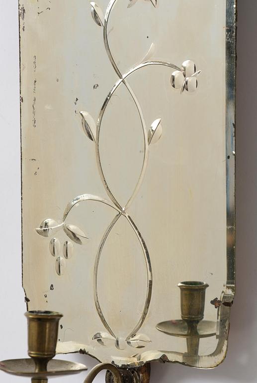 A pair of Swedish engraved-glass one-branch girandole mirrors, later part 18th century.