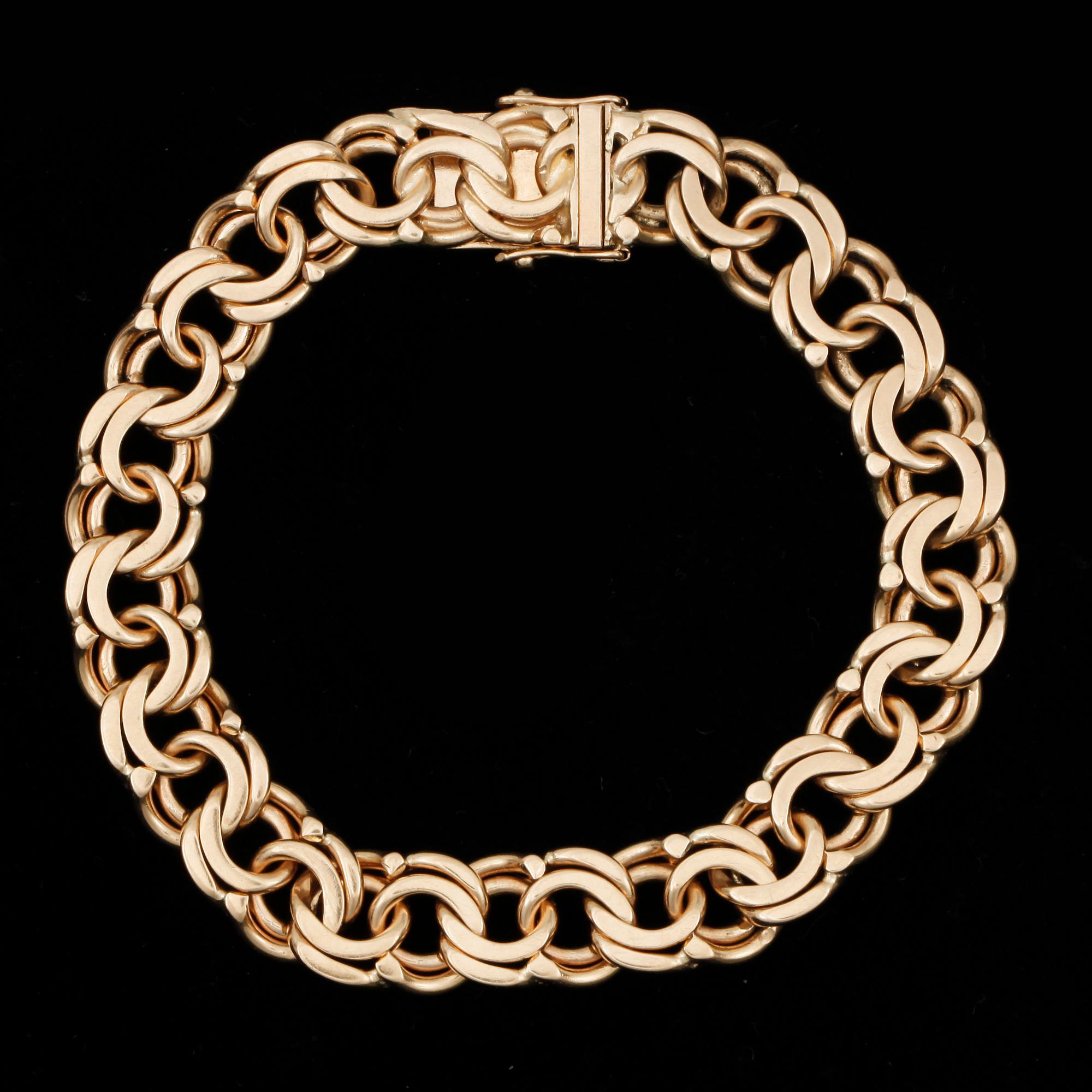 ARMBAND,  18k guld. Stockholm, 1952. Vikt 44g.
