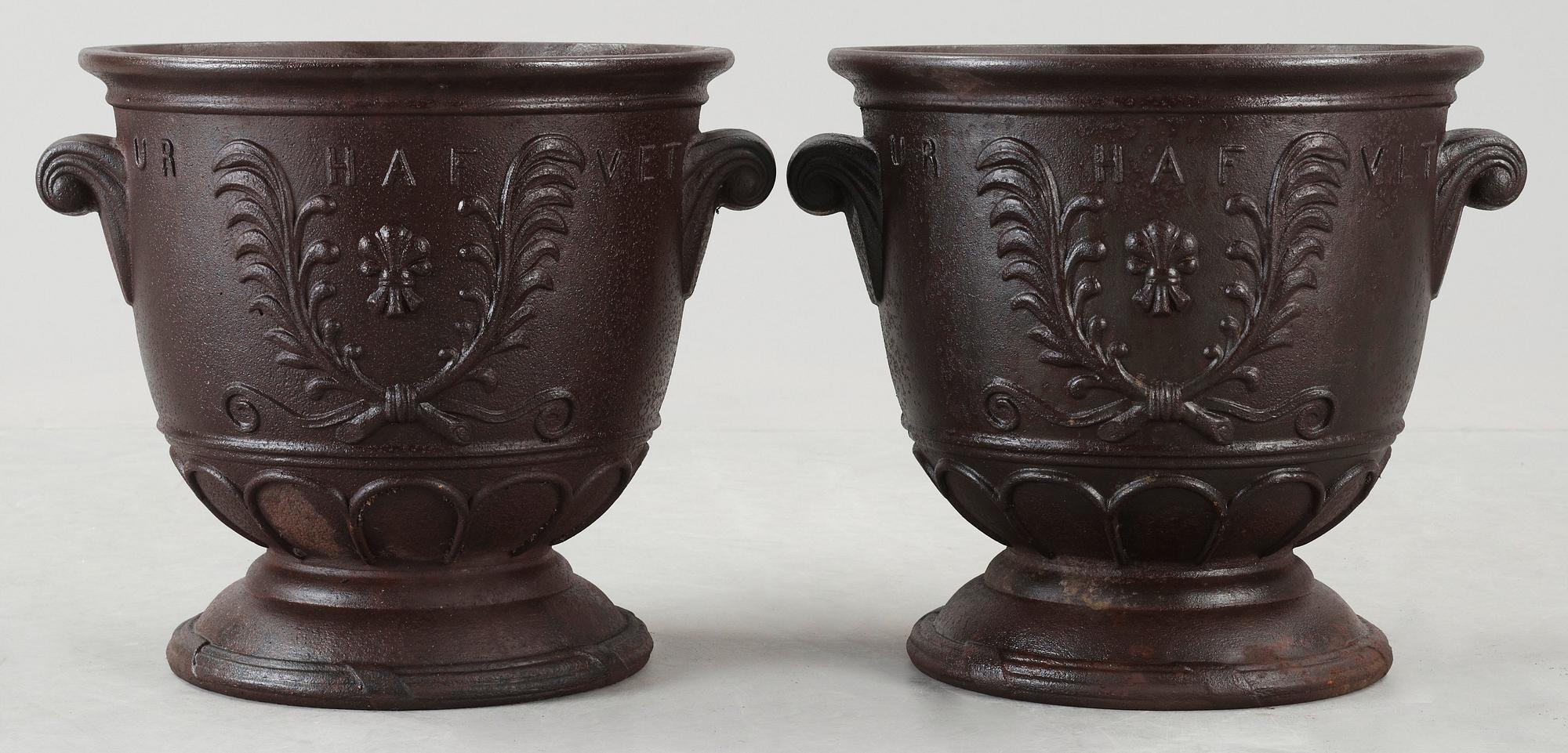 A pair of Ivar Johnsson cast iron jardinieres, Näfveqvarn, Sweden.