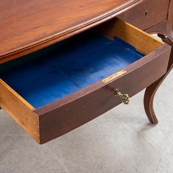 A mahogany Rococo revival desk, late 19th Century.