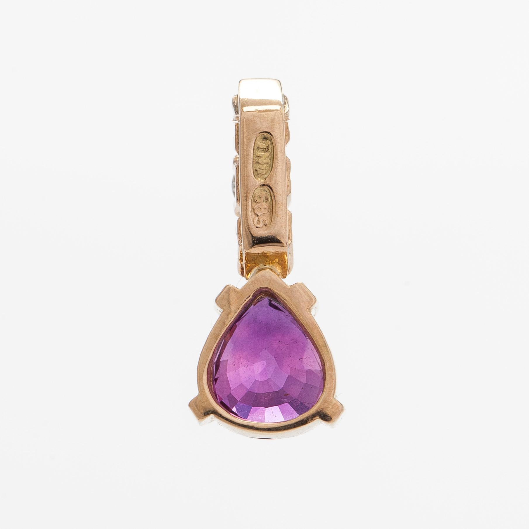 Riipus, 14K kultaa, pisarahiottu rubiini ja timantteja.