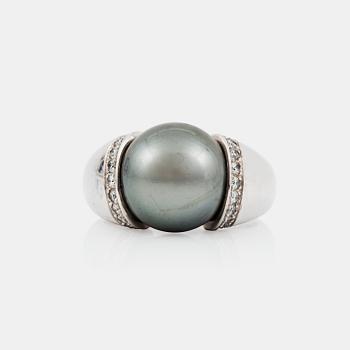 1214. A cultured Tahiti pearl and diamond ring made by Gübelin.