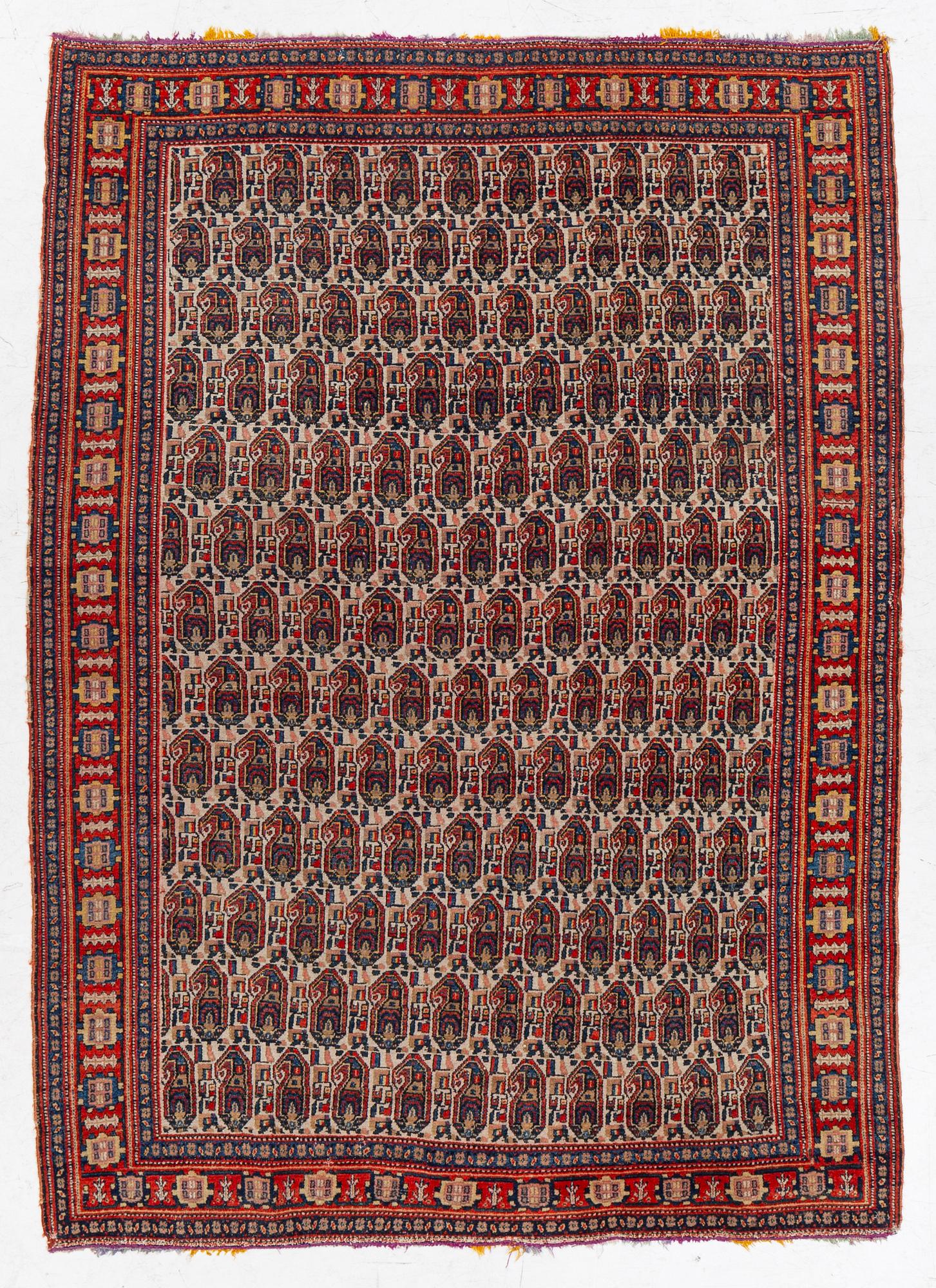 An antique Senneh rug, c 192 x 140 cm.