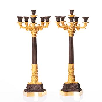 A pair of French Louis Philippe six light candelabra, around 1830.