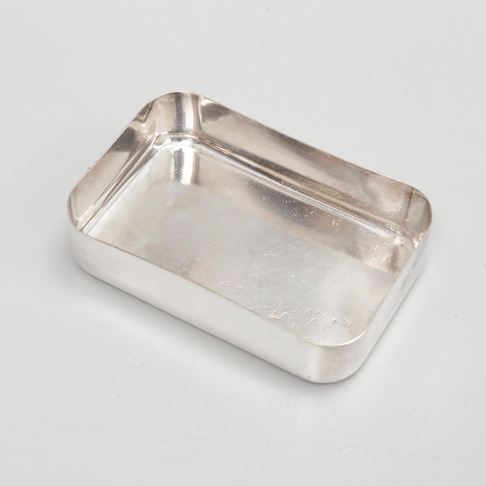 A restaurant serving trolley with silver plate dishes, first half of the/mid 20th century.