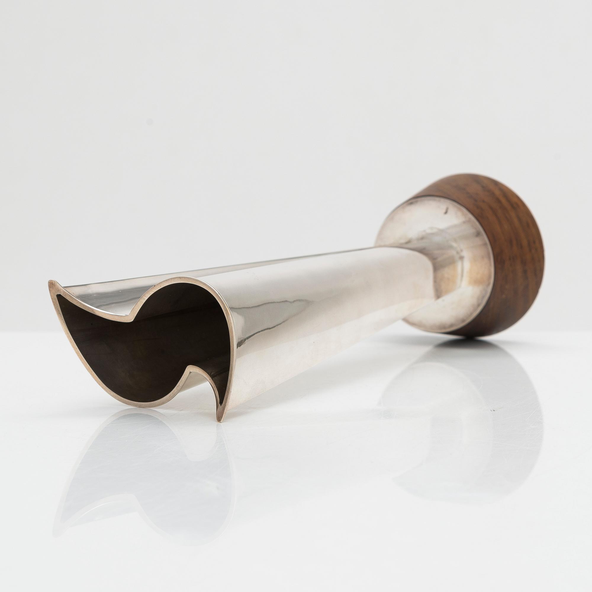 Tapio Wirkkala, a 'Liekki' (Flame) silver vase on a rosewood base, model TW 228, Kultakeskus, Hämeenlinna 1963.