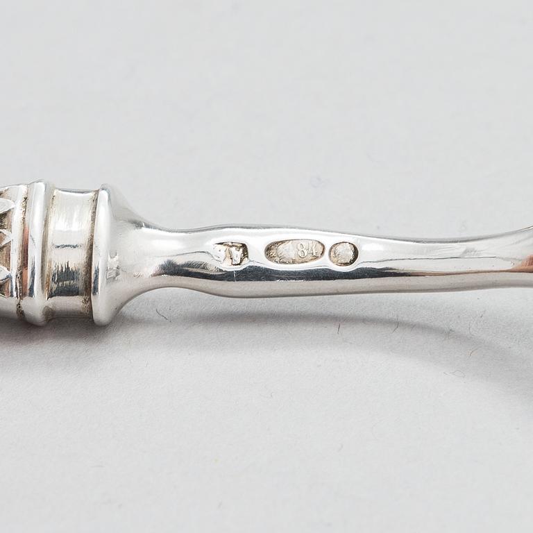 Four pieces of Russian silver cutlery.