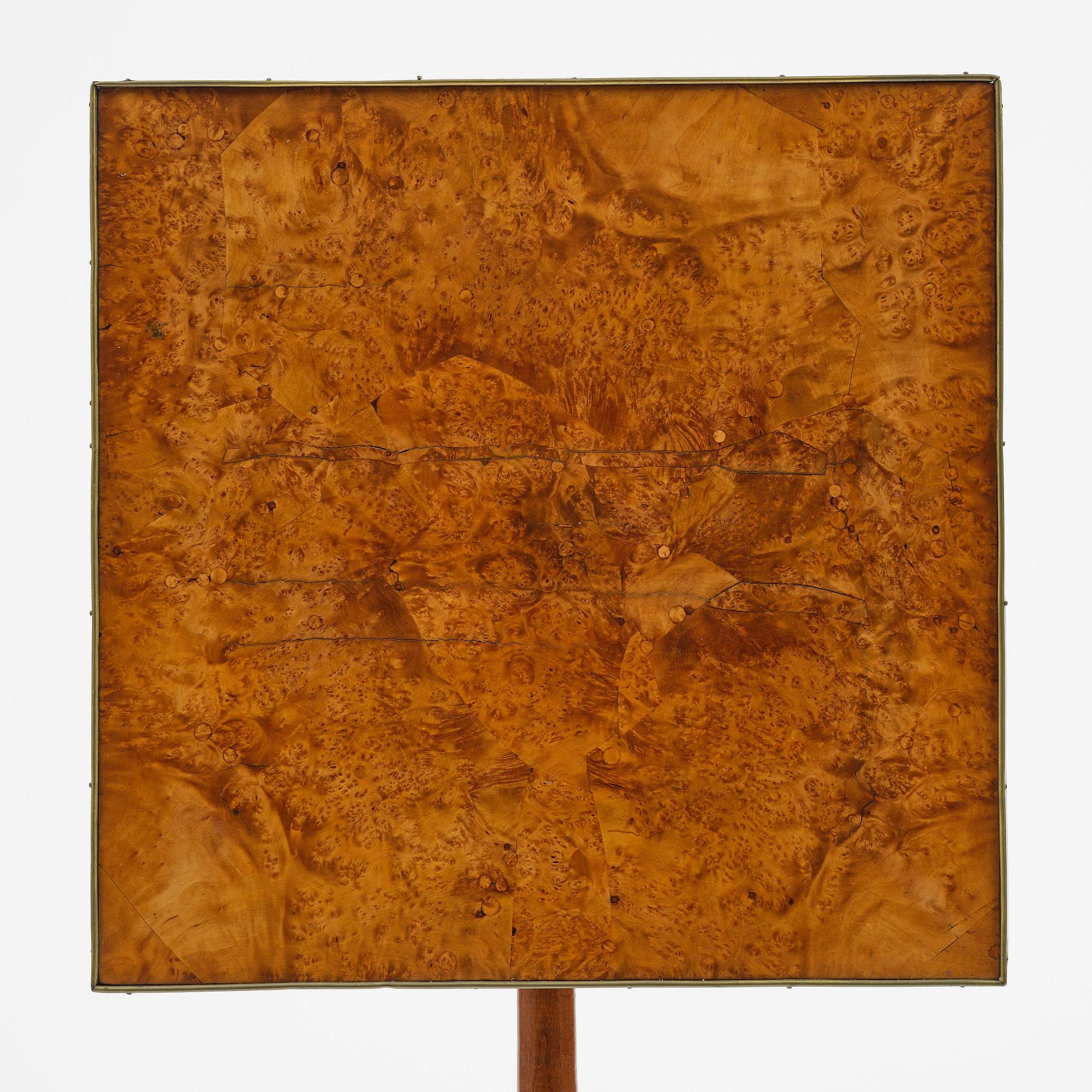 A burr-alder tilt-top table by J. Sjölin (master 1767-85).