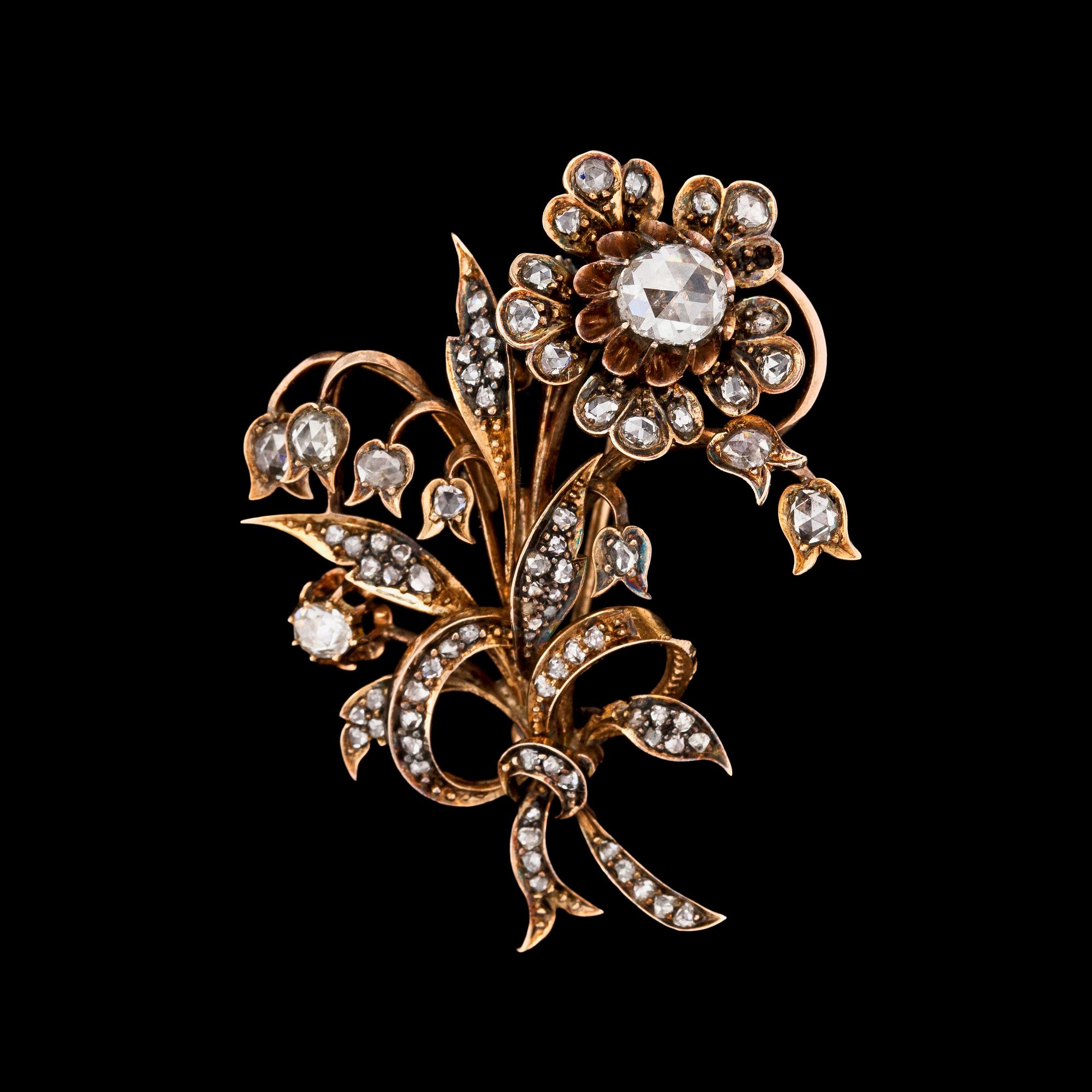 A rose cut diamond brooch, tot. app. 1.20 ct.