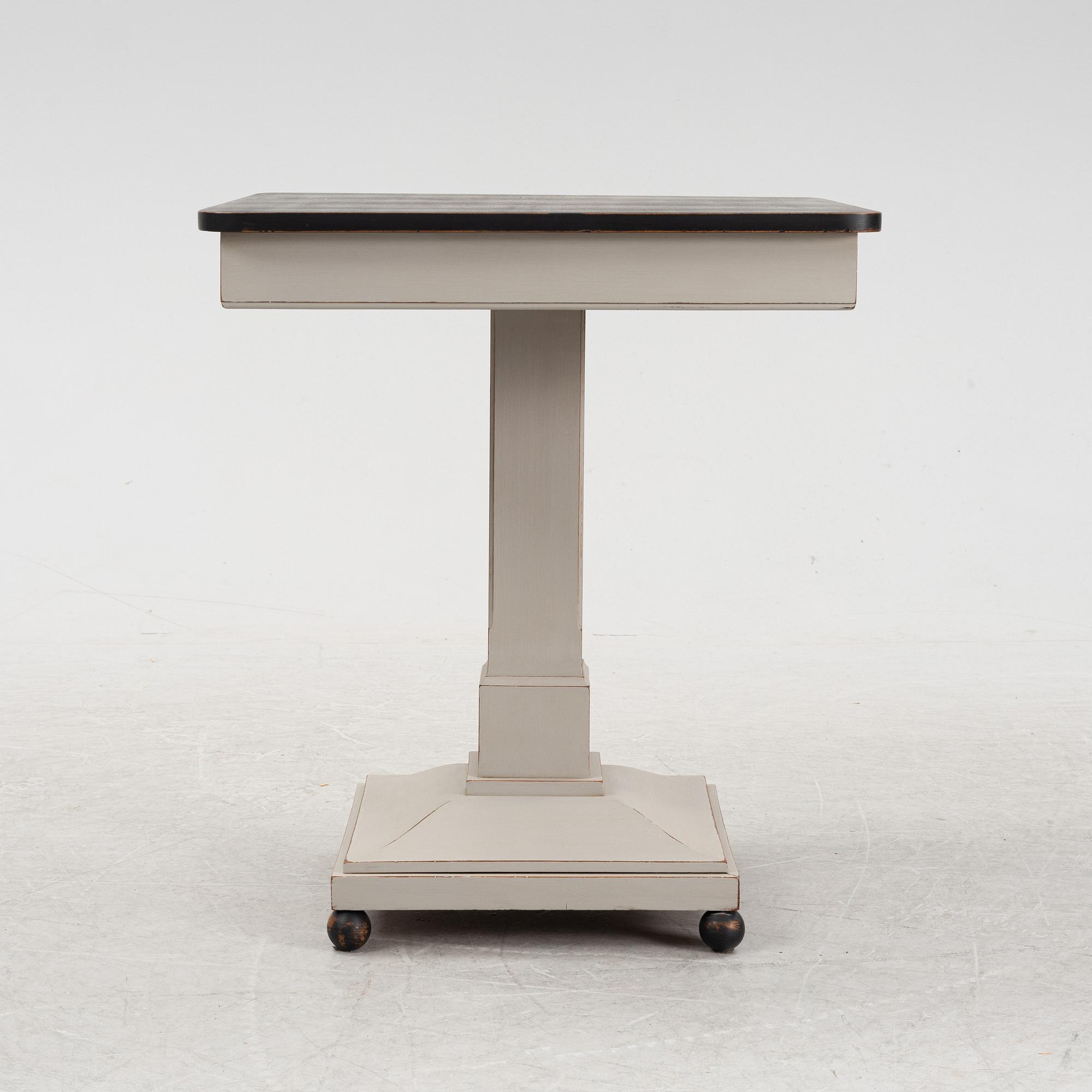 A painted table, early 20th Century.