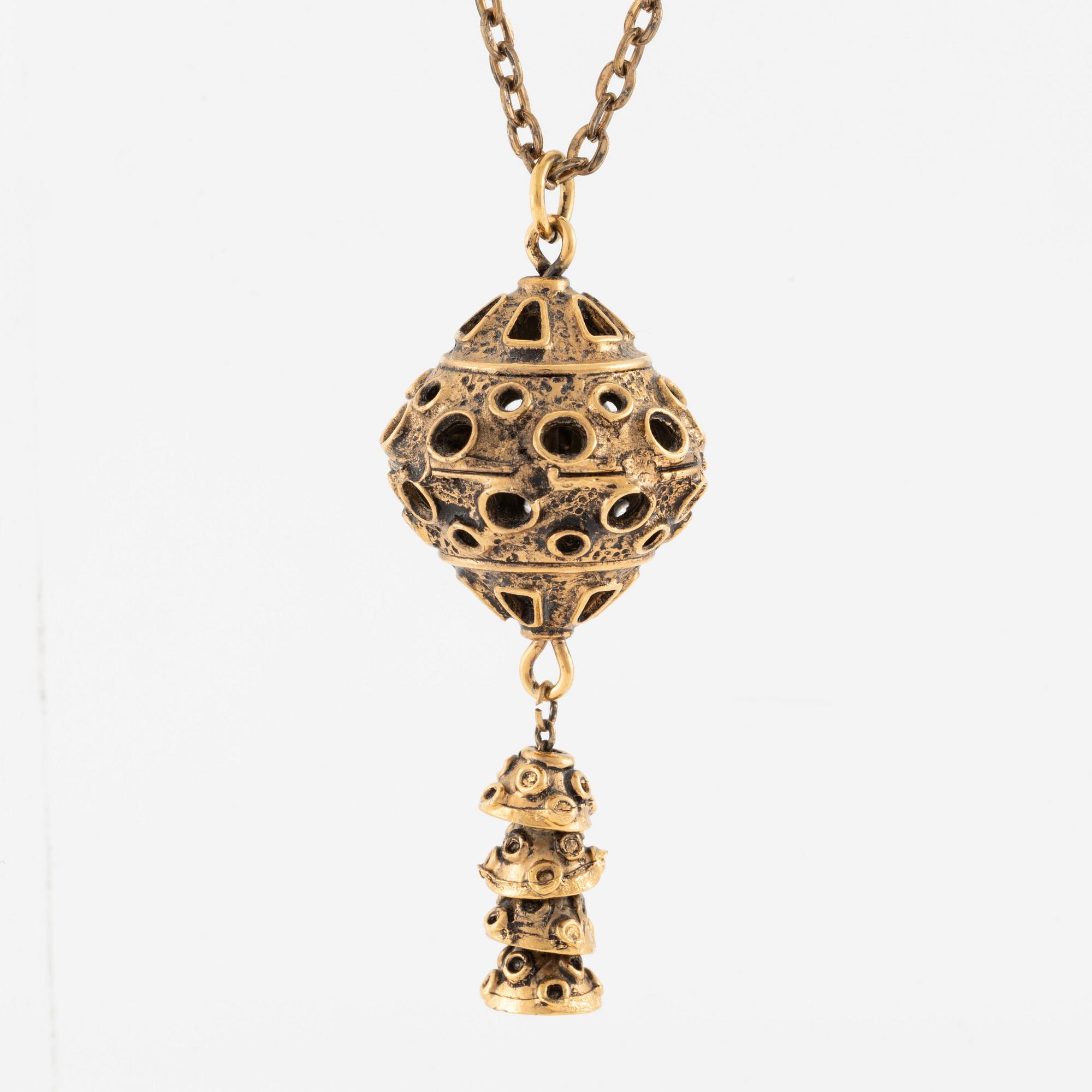 Kalevala Koru, 4 pieces, a pair of earrings, two necklaces, and a brooch, bronze, Finland.