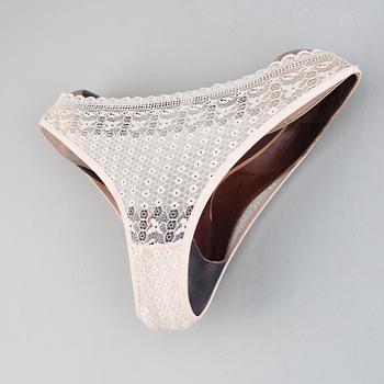 Martin Soto Climent, women's shoes and panties. Executed in 2014.