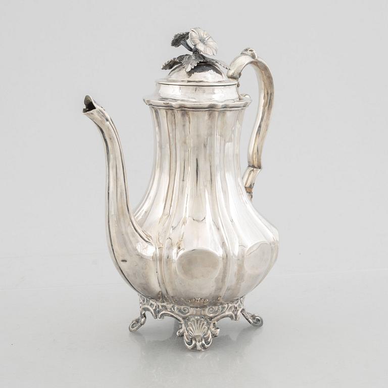 A Swedish Silver Rococo-Revival Coffee Pot, mark of Christian Hammer, Stockholm 1850.