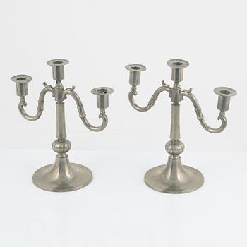 Edvin Ollers, a pair of pewter candelabra, Stockholm, 1922.