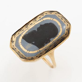A silhouette ring, 18K gold with enamel, Friedrich Silber, Karlskrona 1796.