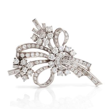 A Platinum brooch/pendant, with brilliant- and baguette-cut diamonds totaling approx. 4.10 ct. With SJL certificate.