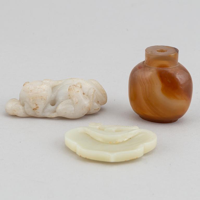 A group of three Chinese nephrite, stone and agathe sculptures and snuff bottle, 20th century.