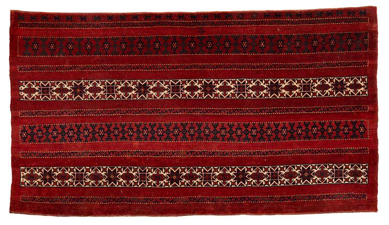 A CHUVAL, an antique Kirgiz/Turkmen, ca 115,5 x 209-211 cm (as well as ca 0,5-1 cm flat weave at the ends).