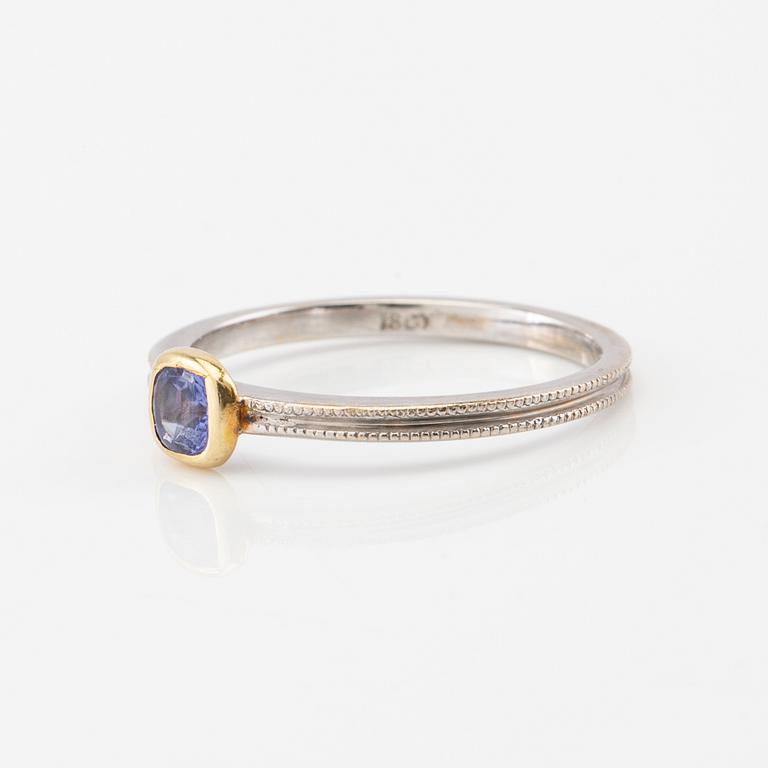 Ring 18K red and white gold with a faceted tanzanite.