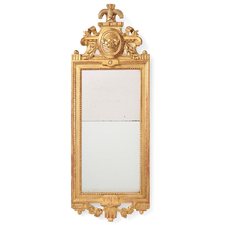 A Gustavian giltwood mirror by C. G. Fyrwald (master in Stockholm 1776-1825).