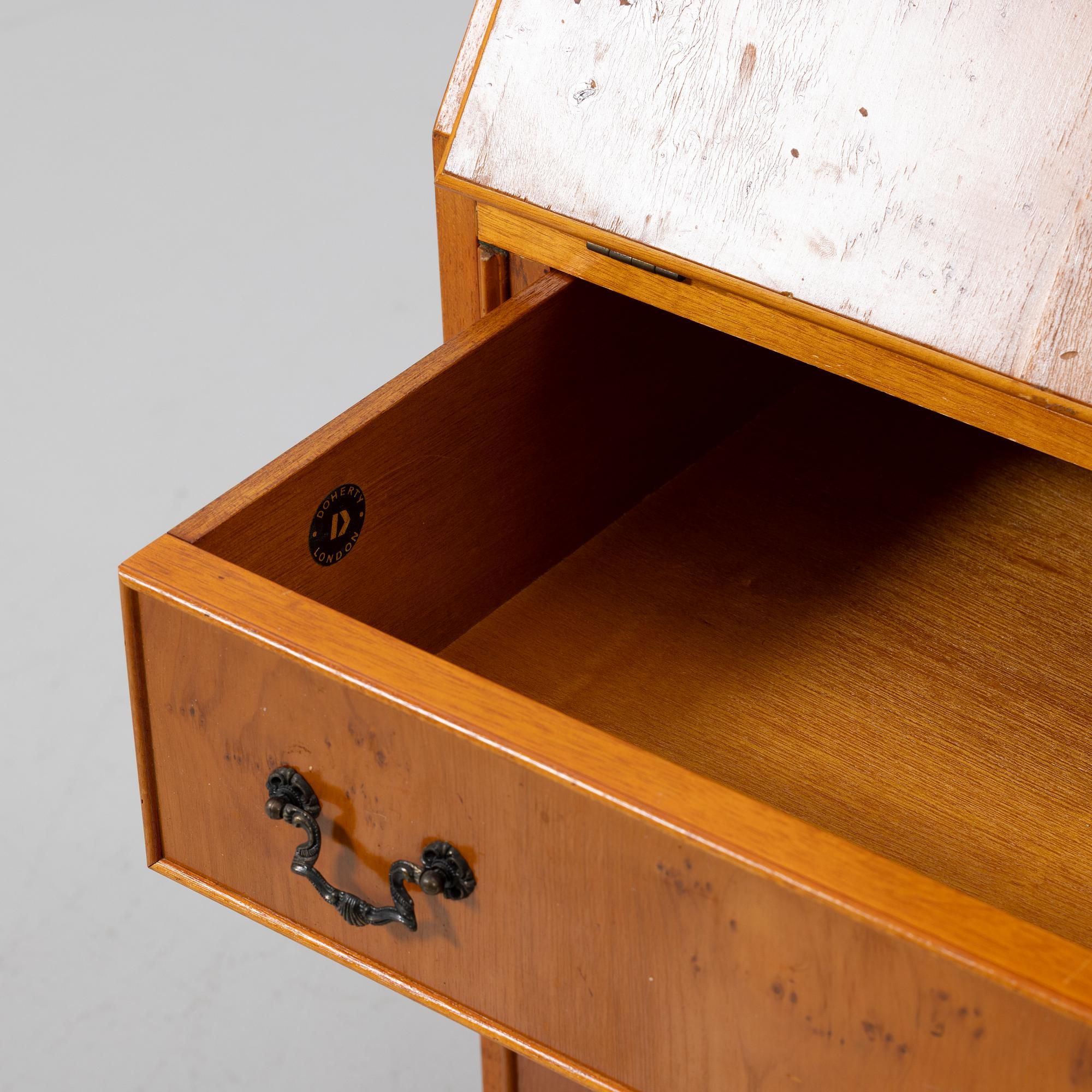 Slant-front secrétaire with glazed cabinet section, 20th century.