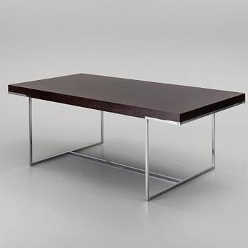 A "Athos" dining table by Paolo Piva for B&B Italia.