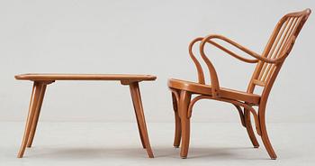 A birch bentwood armchair and table, by Thonet, 1930's.