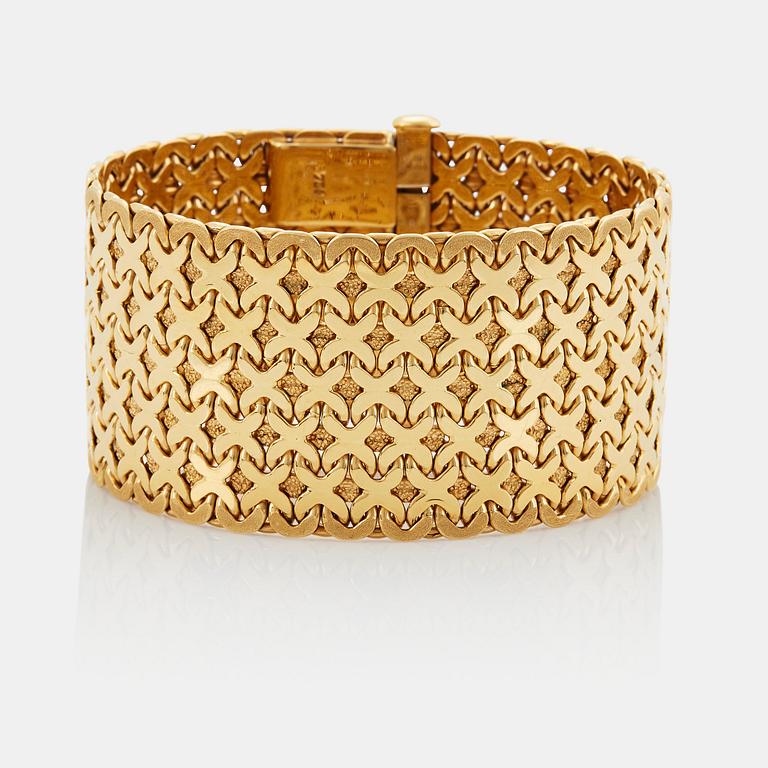 An 18K gold Tännler bracelet.