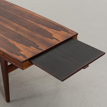 A Johannes Andersen sofa table.