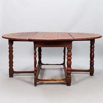 A painted 18th Century Baroque gate leg table.