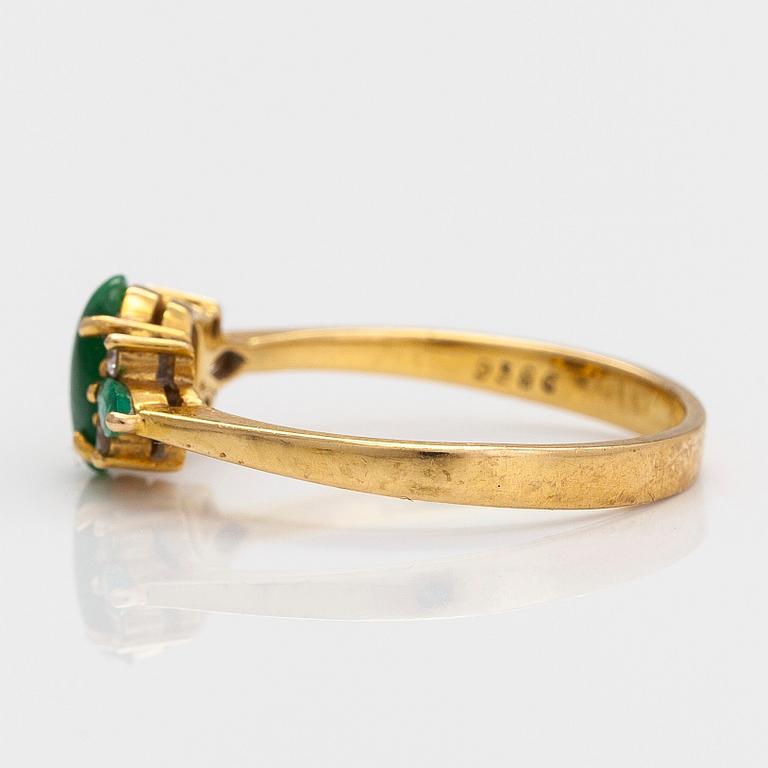 Earrings and ring, 18K gold with jadeite, emeralds, and small diamonds.