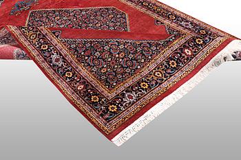 A rug, Tabriz, ca 241 x 167 cm.