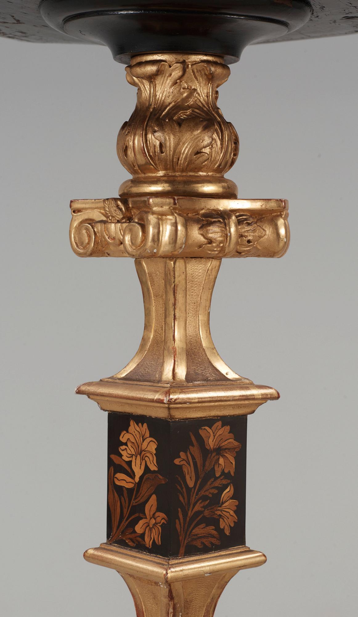 A pair of French Baroque circa 1700 candle stands.