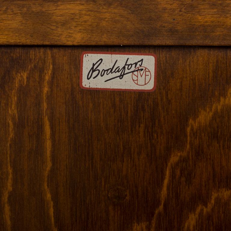 a mid 20th century birch bureau from Axel Larson, Bodafors, model number 954.