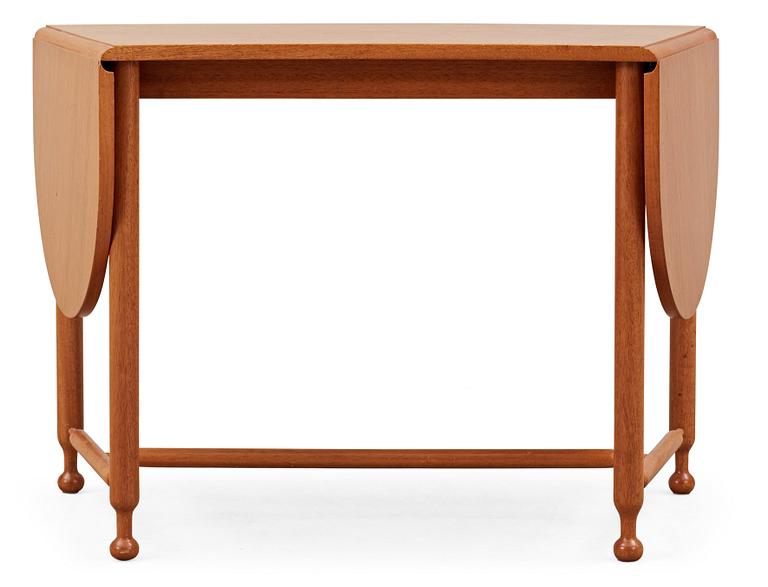 A Josef Frank mahogany table by Svenskt Tenn, model no 1333.