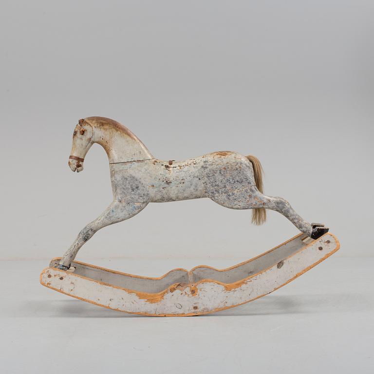 A painted rocking horse second half of the 19th century.