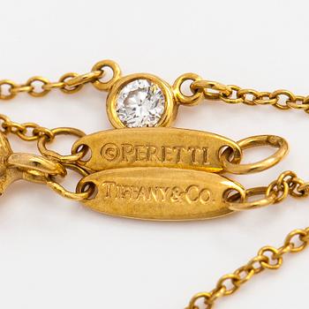 Tiffany & Co, Elsa Peretti, an 18K gold 'Diamonds by the Yard' necklace with a brilliant-cut diamond.