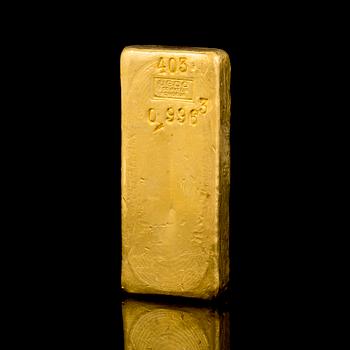 A 23K gold ingot, 1003 g, Ugdo essayeur fondeur.