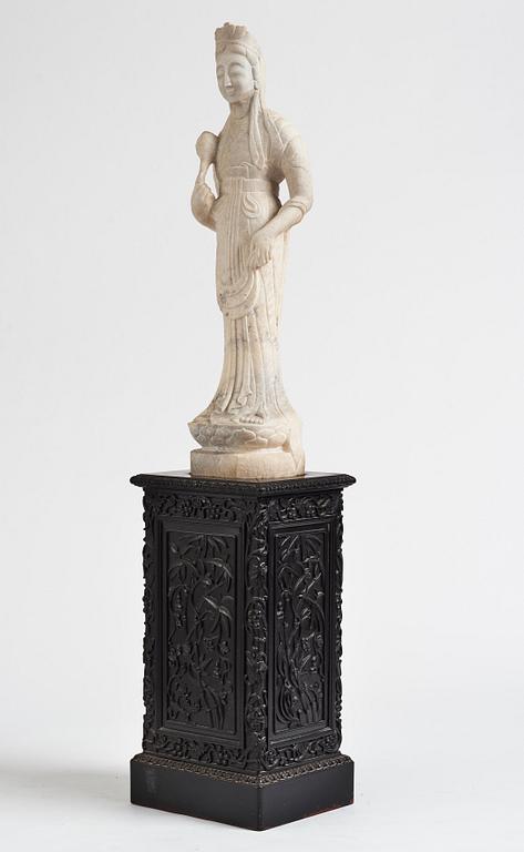 A white stone scultpure of Guanyin, China, presumably early 20th Century.