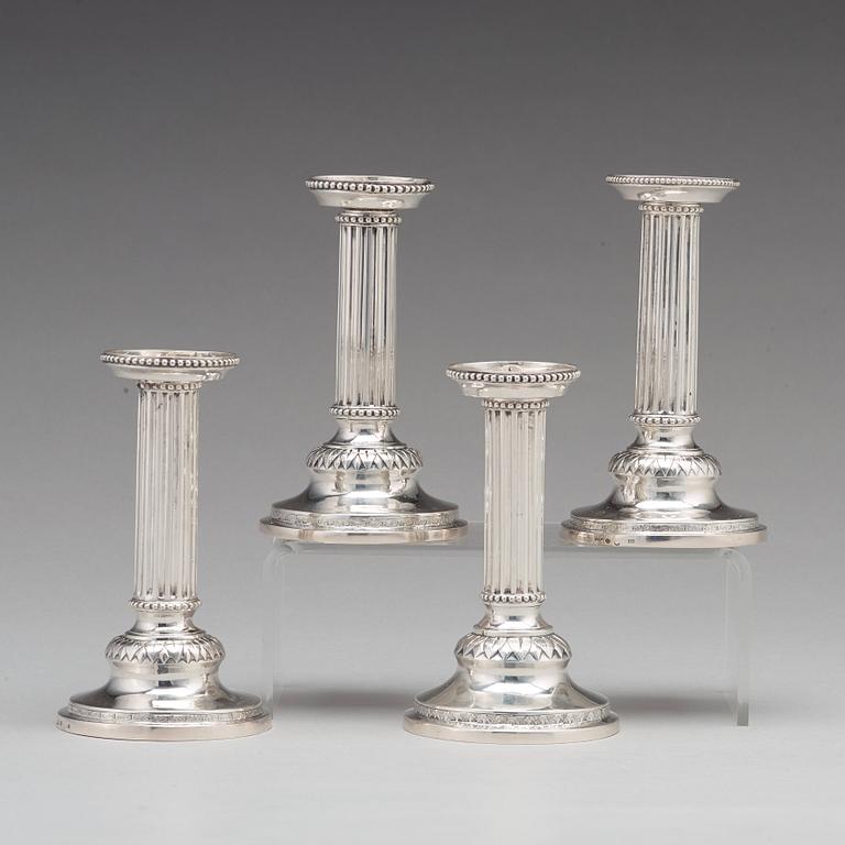 A matched set of four Gustavian silver candlesticks,