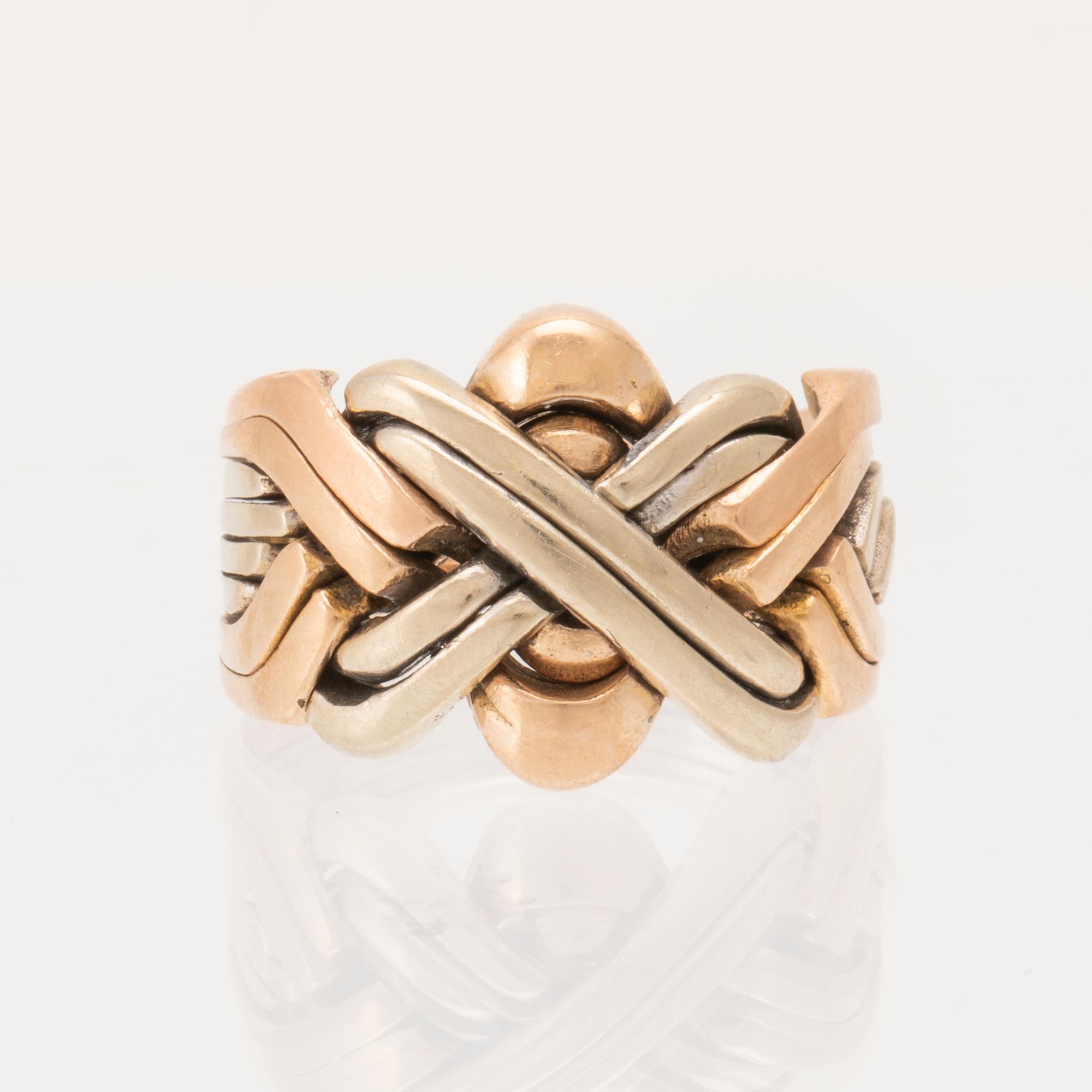 Ring "Pusselring" 14K rosé, vitt och rött guld.