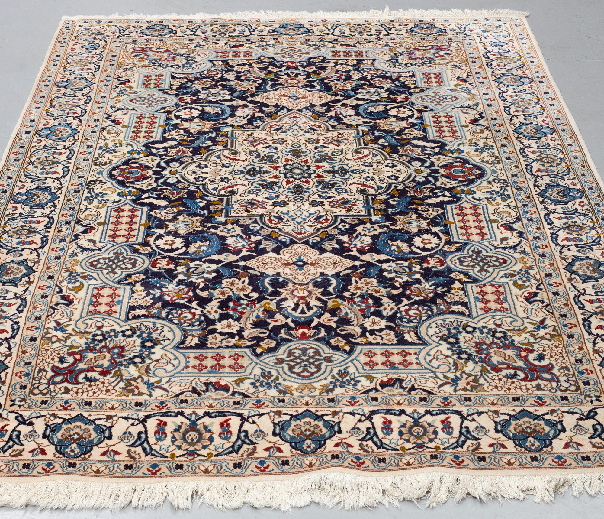 A CARPET, Nain, part silk, ca 258,5 x 165 cm.
