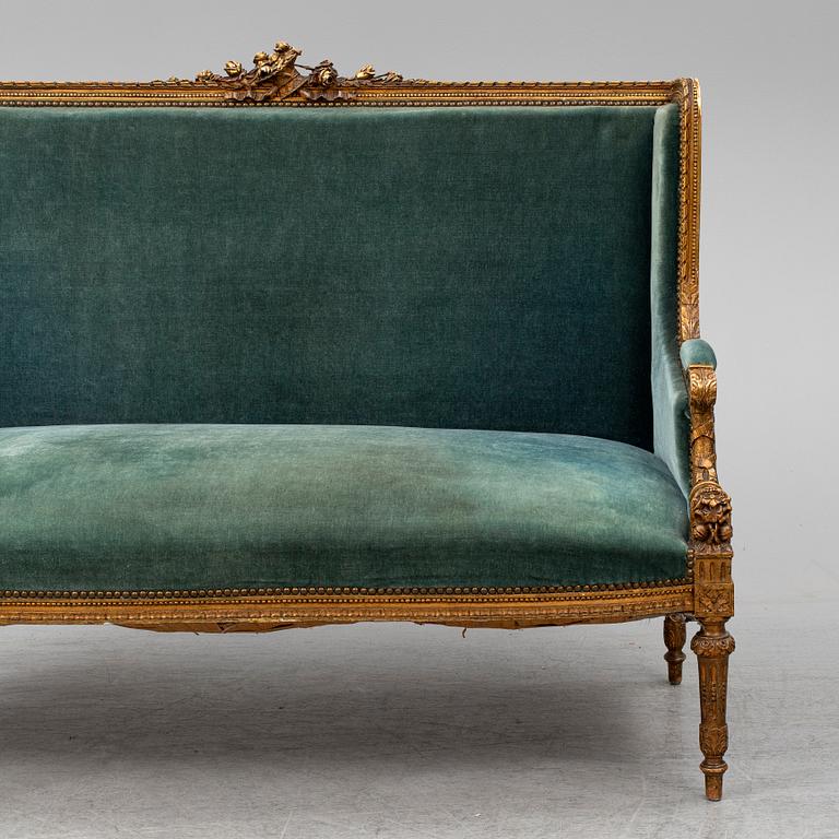A Louis XVI-style sofa, ca 1900.