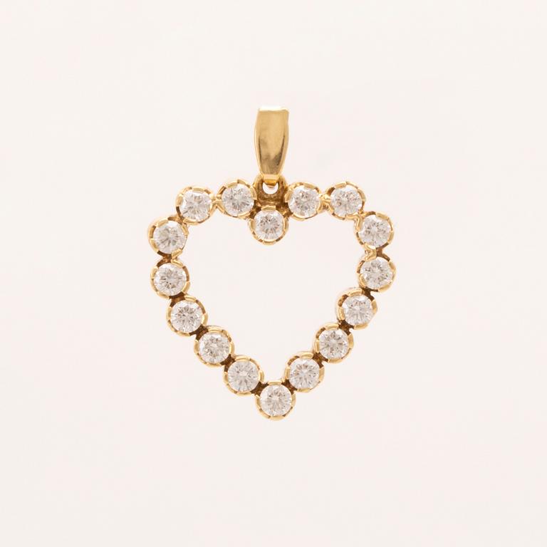 An 18K gold pendant set with round brilliant-cut diamonds.